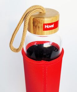 glass bottle with neoprene sleeve with bamboo top